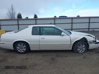 1998 Cadillac Eldorado z VIN 1G6EL12Y2WU603722, wystawiony jako IAAI lot #41879733 z przebiegiem 81 780 mil mil oraz . Historia ofert i sprzedaży dostępna na DreamBid. Obrazek 13.