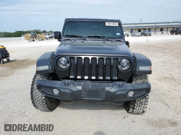 2023 Jeep Wrangler Willys with VIN 1C4HJXDGXPW526093, listed as a Copart auction lot 56818935 with 24,021 mi miles and Salvage title. Bid and sale history available at DreamBid. Image 5.