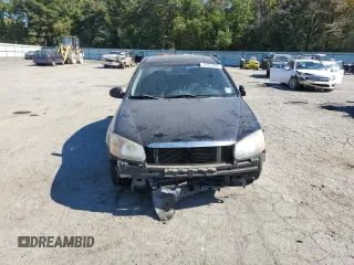 2009 Kia Spectra SX with VIN KNAFE221895022564, listed as a Copart auction lot 76997864 with 189,177 mi miles and Salvage Title. Bid and sale history available at carsss.com. Image 5.