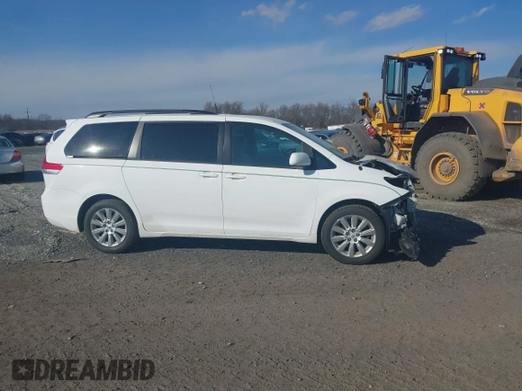 2013 Toyota Sienna LE with VIN 5TDJK3DC0DS066829, listed as a IAAI auction lot 41635076 with 205,808 mi miles and . Bid and sale history available at DreamBid. Image 13.
