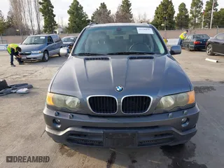 2003 BMW X5 3.0i with VIN 5UXFA53573LV83812, listed as a IAAI auction lot 41590046 with 166,841 mi miles. Bid and sale history available at carsss.com. Image 6.