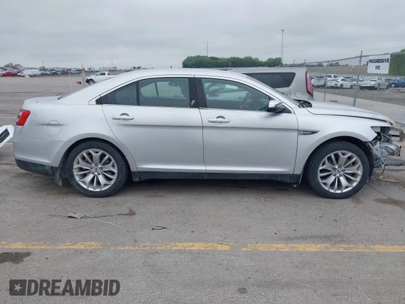 2015 Ford Taurus Limited with VIN 1FAHP2F81FG171224, listed as a IAAI auction lot 42250645 with 125,395 mi miles and . Bid and sale history available at DreamBid. Image 13.