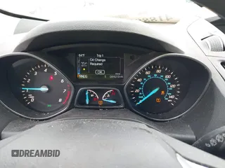 2016 Ford Escape SE with VIN 1FMCU9G99GUC13053, listed as a IAAI auction lot 41888535 with 84,019 mi miles. Bid and sale history available at carsss.com. Image 7.