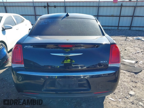 2016 Chrysler 300 Anniversary Edition with VIN 2C3CCAAGXGH261376, listed as a IAAI auction lot 41833894 with 64,489 mi miles and . Bid and sale history available at DreamBid. Image 17.