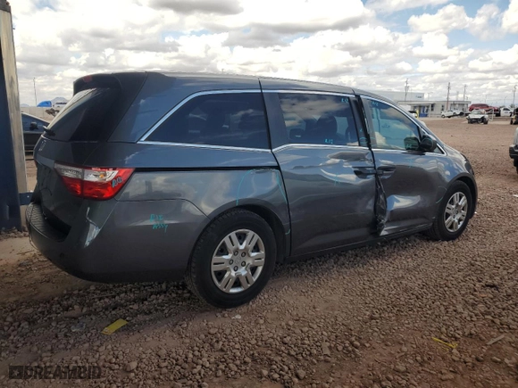 2012 Honda Odyssey LX with VIN 5FNRL5H21CB013296, listed as a Copart auction lot 48512625 with 69,381 mi miles and Salvage Title. Bid and sale history available at carsss.com. Image 3.