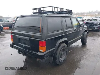1996 Jeep Cherokee SE with VIN 1J4FJ28S9TL135564, listed as a IAAI auction lot 41618367 with 249,410 mi miles and . Bid and sale history available at DreamBid. Image 4.