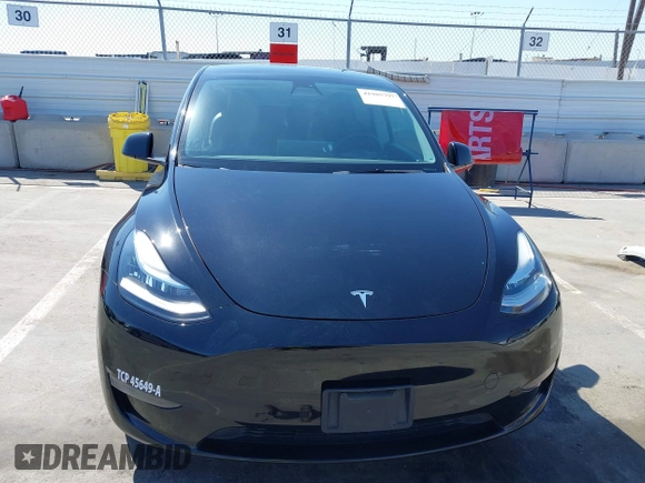 2022 Tesla Model Y Long Range with VIN 7SAYGDEE6NF480471, listed as a IAAI auction lot 41985797 with 82,777 mi miles and . Bid and sale history available at DreamBid. Image 13.