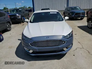 2017 Ford Fusion SE z VIN 3FA6P0H70HR328463, wystawiony jako Copart lot #57768095 z przebiegiem 115 950 mil mil oraz Nie do naprawy • Non repairable. Historia ofert i sprzedaży dostępna na DreamBid. Obrazek 5.