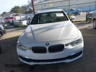 2016 BMW 3 Series 328i with VIN WBA8E9G58GNT47869, listed as a IAAI auction lot 41594120 with 57,561 mi miles. Bid and sale history available at carsss.com. Image 12.