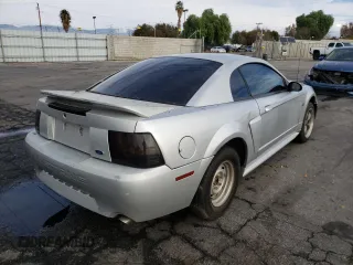 2002 Ford Mustang GT Deluxe with VIN 1FAFP42X72F239123, listed as a Copart auction lot 67717881 with 156,405 mi miles and Non Repairable. Bid and sale history available at carsss.com. Image 4.