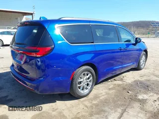 2021 Chrysler Pacifica Touring with VIN 2C4RC1FG5MR511546, listed as a IAAI auction lot 41882085 with 85,635 mi miles and . Bid and sale history available at DreamBid. Image 4.