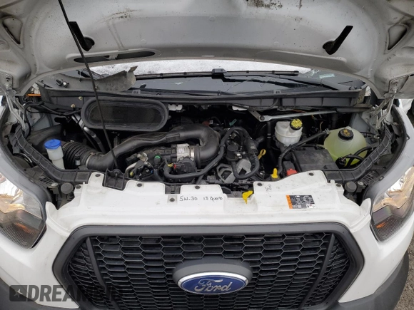 2023 Ford Transit with VIN 1FDAX2X84PKA86334, listed as a Copart auction lot 84940534 with 14,670 mi miles and Salvage Title. Bid and sale history available at DreamBid. Image 12.
