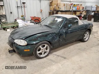 2002 Mazda MX-5 Miata Cloth z VIN JM1NB353820230635, wystawiony jako Copart lot #47834345 z przebiegiem 149 549 mil mil oraz Nie do naprawy • Non repairable. Historia ofert i sprzedaży dostępna na DreamBid. Obrazek 1.