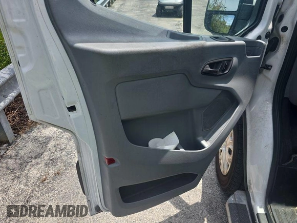 2018 Ford Transit with VIN 1FTYR1ZMXJKB47999, listed as a IAAI auction lot 42787302 with 140,957 mi miles and . Bid and sale history available at DreamBid. Image 11.