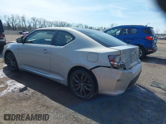 2014 Scion tC with VIN JTKJF5C70E3068144, listed as a IAAI auction lot 41983751 with 137,894 mi miles. Bid and sale history available at carsss.com. Image 3.