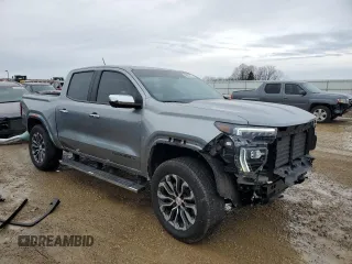 2023 GMC Canyon 4WD Denali with VIN 1GTP6FEK2P1176773, listed as a Copart auction lot 46045715 with 9,711 mi miles and Salvage Title. Bid and sale history available at carsss.com. Image 4.
