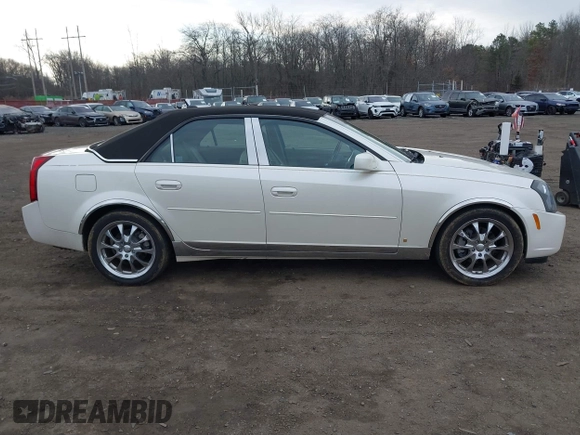2007 Cadillac CTS z VIN 1G6DP577070131729, wystawiony jako IAAI lot #41717213 z przebiegiem 35 930 mil mil oraz . Historia ofert i sprzedaży dostępna na DreamBid. Obrazek 13.