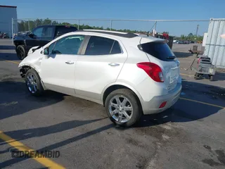 2016 Buick Encore Premium with VIN KL4CJDSB1GB647306, listed as a IAAI auction lot 41983159 with 59,592 mi miles. Bid and sale history available at carsss.com. Image 3.