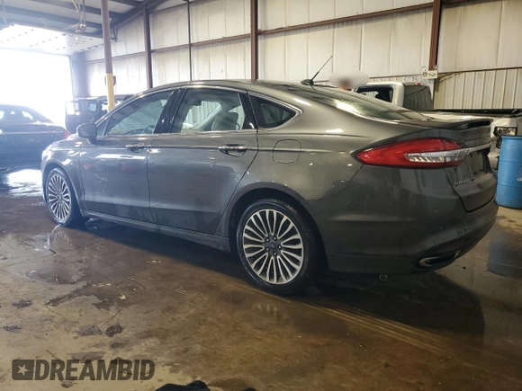 2017 Ford Fusion Titanium z VIN 3FA6P0D93HR303905, wystawiony jako Copart lot #63621745 z przebiegiem 120 249 mil mil oraz Szkoda całkowita • Salvage title. Historia ofert i sprzedaży dostępna na DreamBid. Obrazek 2.