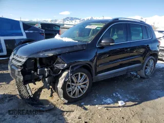 2015 Volkswagen Tiguan SE z VIN WVGBV7AX9FW516731, wystawiony jako Copart lot #49508815 z przebiegiem 172 072 mil mil oraz Szkody całkowita. Historia ofert i sprzedaży dostępna na DreamBid. Obrazek 1.