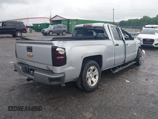 2014 Chevrolet Silverado 1500 LT with VIN 1GCRCREH4EZ395398, listed as a IAAI auction lot 42245009 with 201,552 mi miles and . Bid and sale history available at DreamBid. Image 4.