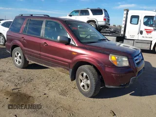 2007 Honda Pilot EX-L with VIN 2HKYF18677H524713, listed as a IAAI auction lot 41345312 with 169,957 mi miles and . Bid and sale history available at DreamBid. Image 1.