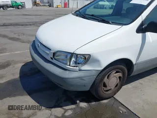 1998 Toyota Sienna LE with VIN 4T3ZF13C2WU066460, listed as a IAAI auction lot 42088006 with 169,014 mi miles and . Bid and sale history available at DreamBid. Image 6.