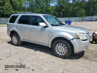 2009 Mercury Mariner Premier z VIN 4M2CU87G19KJ14006, wystawiony jako Copart lot #63615445 z przebiegiem 216 941 mil mil oraz Szkoda całkowita • Salvage title. Historia ofert i sprzedaży dostępna na DreamBid. Obrazek 4.