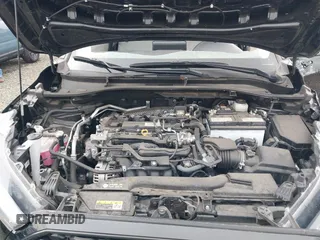 2023 Toyota Corolla Cross L with VIN 7MUAAABG3PV049367, listed as a IAAI auction lot 42370328 with 15,207 mi miles and . Bid and sale history available at DreamBid. Image 10.