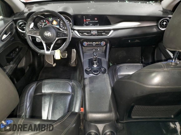 2019 Alfa Romeo Stelvio z VIN ZASPAKAN2K7C32117, wystawiony jako Copart lot #41795675 z przebiegiem 90 124 mil mil oraz Szkoda całkowita • Salvage title. Historia ofert i sprzedaży dostępna na DreamBid. Obrazek 8.