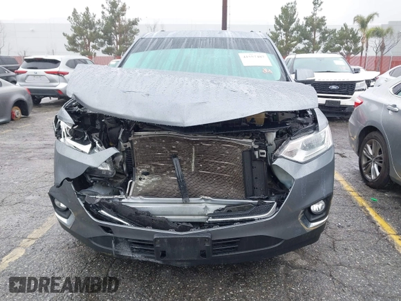 2021 Chevrolet Traverse LT z VIN 1GNERHKWXMJ249859, wystawiony jako IAAI lot #41557487 z przebiegiem 49 849 mil mil oraz . Historia ofert i sprzedaży dostępna na DreamBid. Obrazek 6.