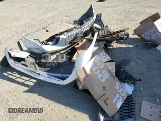 2018 Nissan NV200 SV z VIN 3N6CM0KNXJK700111, wystawiony jako Copart lot #53747595 z przebiegiem Nie podano mil oraz Szkoda całkowita • Salvage title. Historia ofert i sprzedaży dostępna na DreamBid. Obrazek 13.