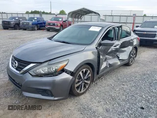 2016 Nissan Altima SR with VIN 1N4AL3AP2GC220196, listed as a IAAI auction lot 42362704 with 104,939 mi miles and . Bid and sale history available at DreamBid. Image 6.