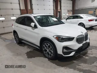 2021 BMW X1 xDrive28i with VIN WBXJG9C04M5T82884, listed as a IAAI auction lot 42242890 with 24,647 mi miles and . Bid and sale history available at DreamBid. Image 1.