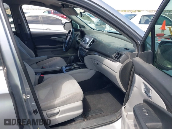 2016 Honda Pilot LX with VIN 5FNYF5H10GB044006, listed as a IAAI auction lot 42075404 with 129,642 mi miles and . Bid and sale history available at DreamBid. Image 5.