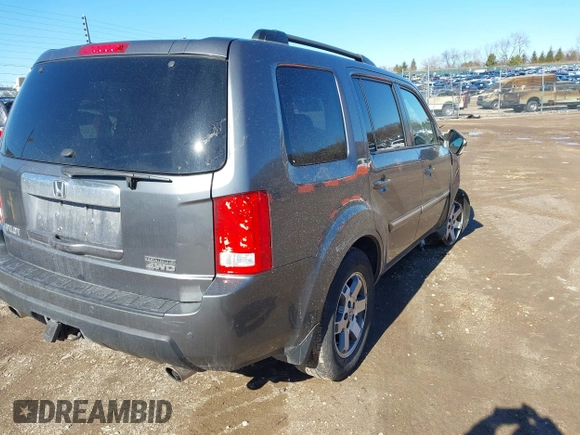 2010 Honda Pilot Touring with VIN 5FNYF4H93AB008589, listed as a IAAI auction lot 41731084 with 138,554 mi miles and . Bid and sale history available at carsss.com. Image 4.