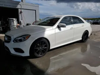 2014 Mercedes-Benz E-Class E 250 BlueTEC Luxury with VIN WDDHF0EB1EA910386, listed as a Copart auction lot 47029085 with 113,522 mi miles and Salvage Title. Bid and sale history available at carsss.com. Image 1.