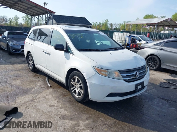 2011 Honda Odyssey EX-L with VIN 5FNRL5H6XBB059162, listed as a IAAI auction lot 42061378 with 164,317 mi miles and . Bid and sale history available at carsss.com. Image 1.