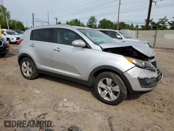2012 Kia Sportage LX z VIN KNDPB3A29C7264856, wystawiony jako Copart lot #58397685 z przebiegiem 144 621 mil mil oraz Szkoda całkowita • Salvage title. Historia ofert i sprzedaży dostępna na DreamBid. Obrazek 4.