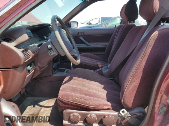 1991 Toyota Camry DLX z VIN 4T1SV21E4MU332100, wystawiony jako Copart lot #64645474 z przebiegiem 164 143 mil mil oraz Czysty tytuł • Clean title. Historia ofert i sprzedaży dostępna na DreamBid. Obrazek 7.