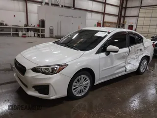 2018 Subaru Impreza Premium with VIN 4S3GKAB68J3610714, listed as a IAAI auction lot 41774380 with 114,745 mi miles. Bid and sale history available at carsss.com. Image 2.