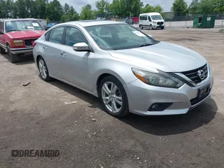 2017 Nissan Altima SL z VIN 1N4BL3AP6HC151471, wystawiony jako IAAI lot #42452990 z przebiegiem 142 394 mil mil oraz . Historia ofert i sprzedaży dostępna na DreamBid. Obrazek 1.
