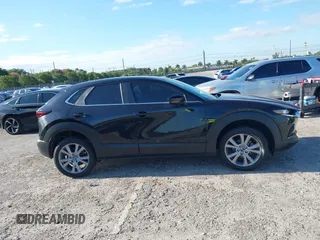 2023 Mazda CX-30 S Select with VIN 3MVDMBBM9PM508958, listed as a IAAI auction lot 42009029 with 21,219 mi miles and . Bid and sale history available at DreamBid. Image 14.