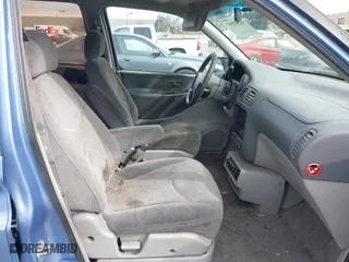 1997 Nissan Quest XE with VIN 4N2DN1117VD801599, listed as a IAAI auction lot 41558507 with 205,064 mi miles. Bid and sale history available at carsss.com. Image 5.