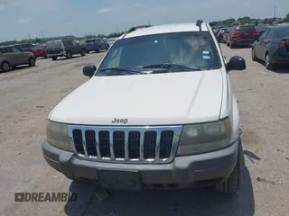 2003 Jeep Grand Cherokee Laredo with VIN 1J4GX48S63C546208, listed as a IAAI auction lot 42288811 with 141,696 mi miles and . Bid and sale history available at DreamBid. Image 6.