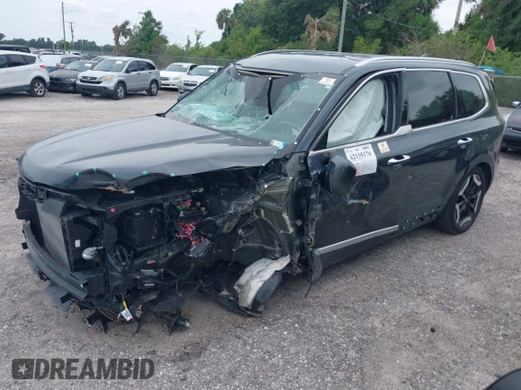 2023 Kia Telluride S z VIN 5XYP6DGC7PG405488, wystawiony jako IAAI lot #42135176 z przebiegiem 16 799 mil mil oraz . Historia ofert i sprzedaży dostępna na DreamBid. Obrazek 2.