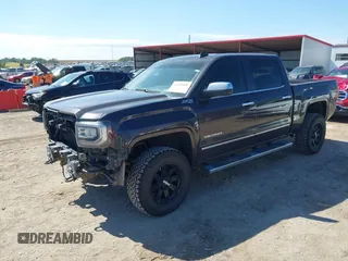 2016 GMC Sierra 1500 SLT with VIN 3GTU2NEC4GG285688, listed as a IAAI auction lot 40394598 with 121,940 mi miles and . Bid and sale history available at DreamBid. Image 2.