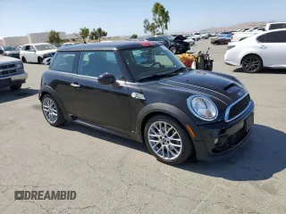 2011 MINI Hardtop S with VIN WMWSV3C57BTY16043, listed as a Copart auction lot 59337575 with 84,617 mi miles and Salvage title. Bid and sale history available at DreamBid. Image 4.