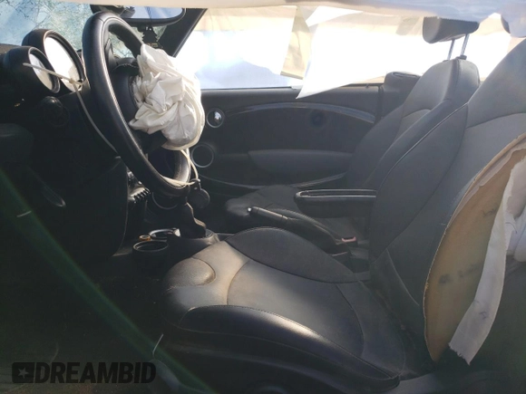2012 MINI Convertible S with VIN WMWZP3C54CT296796, listed as a Copart auction lot 72209604 with 90,864 mi miles and Salvage title. Bid and sale history available at DreamBid. Image 7.