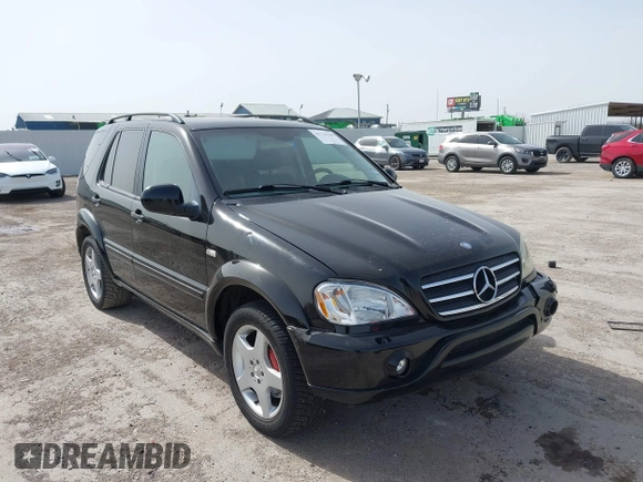 2001 Mercedes-Benz M-Class AMG with VIN 4JGAB74E51A272841, listed as a IAAI auction lot 41734340 with 168,387 mi miles. Bid and sale history available at carsss.com. Image 1.
